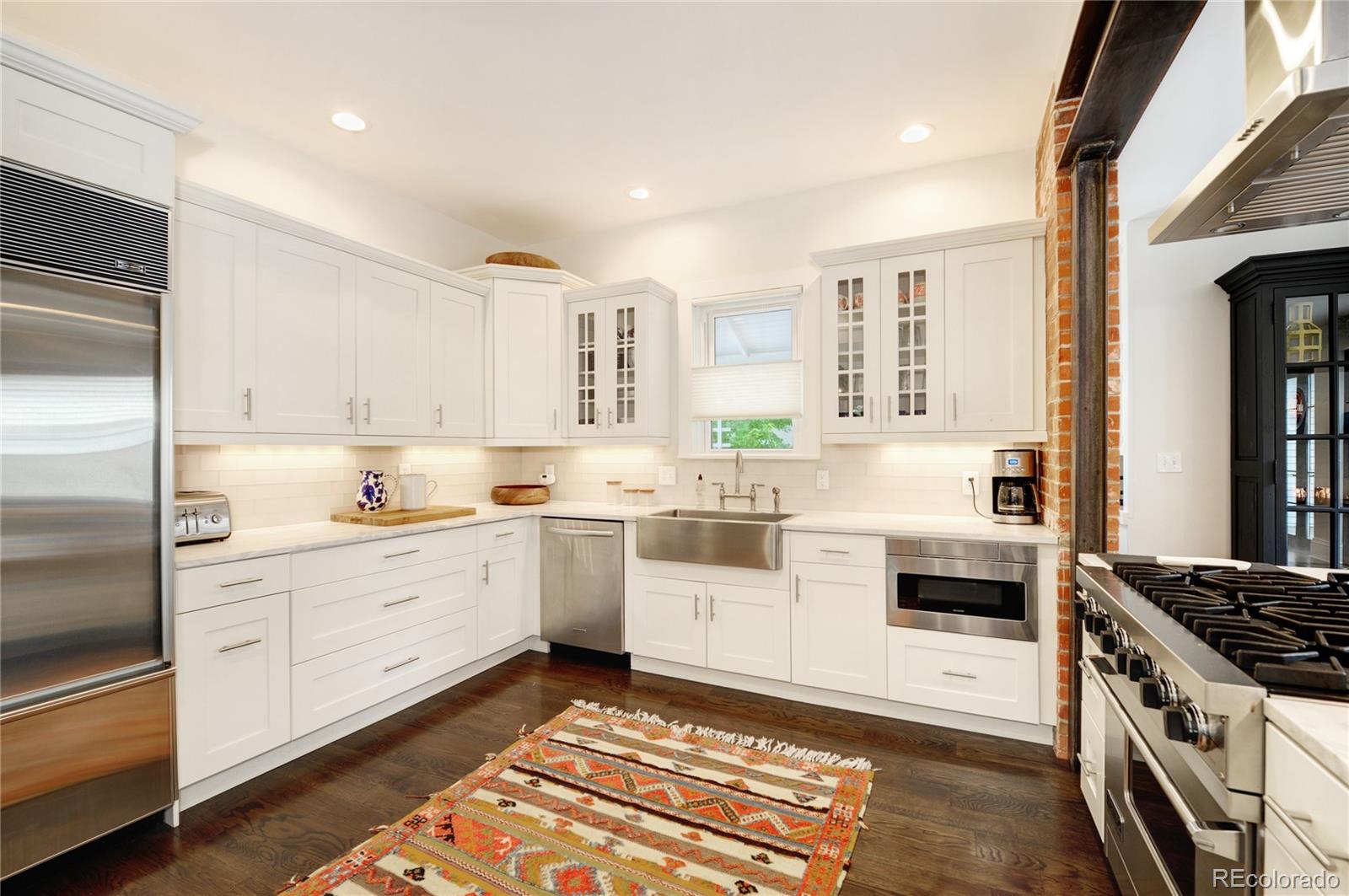 2040 Walnut Street Boulder, CO 80302 - Photo 14 of 40 a kitchen with a stove oven and sink