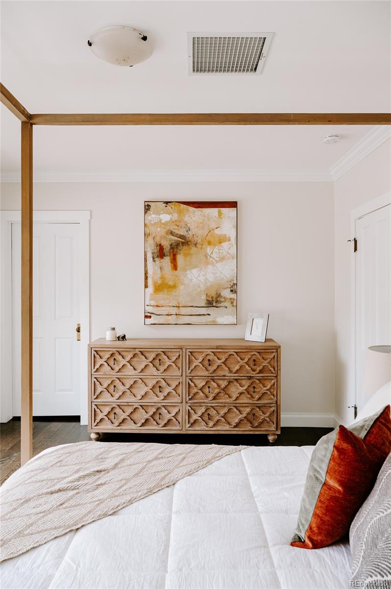2040 Walnut Street Boulder, CO 80302 - Photo 21 of 40 a bed sitting in a bedroom next to a window