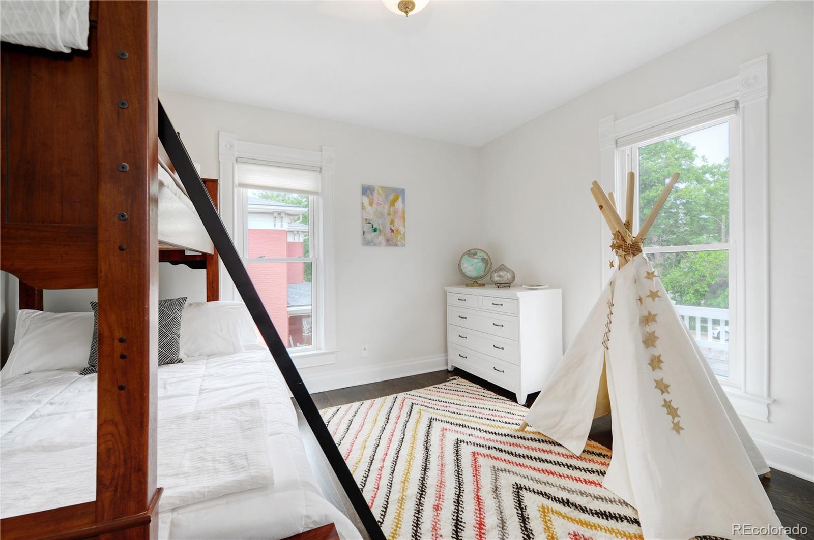 2040 Walnut Street Boulder, CO 80302 - Photo 29 of 40 a view of a livingroom with furniture and stairs
