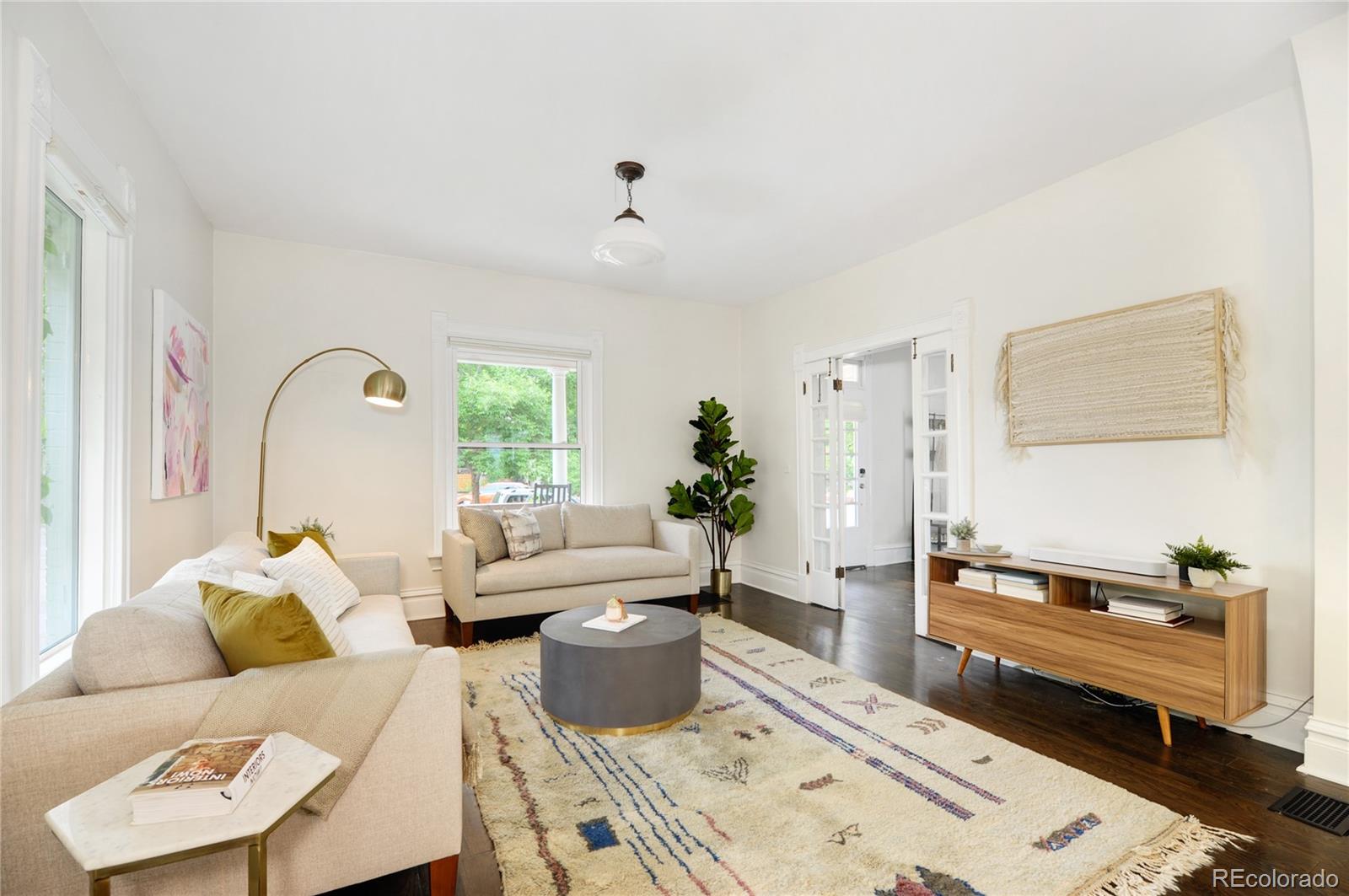 2040 Walnut Street Boulder, CO 80302 - Photo 5 of 40 a living room with furniture and wooden floor