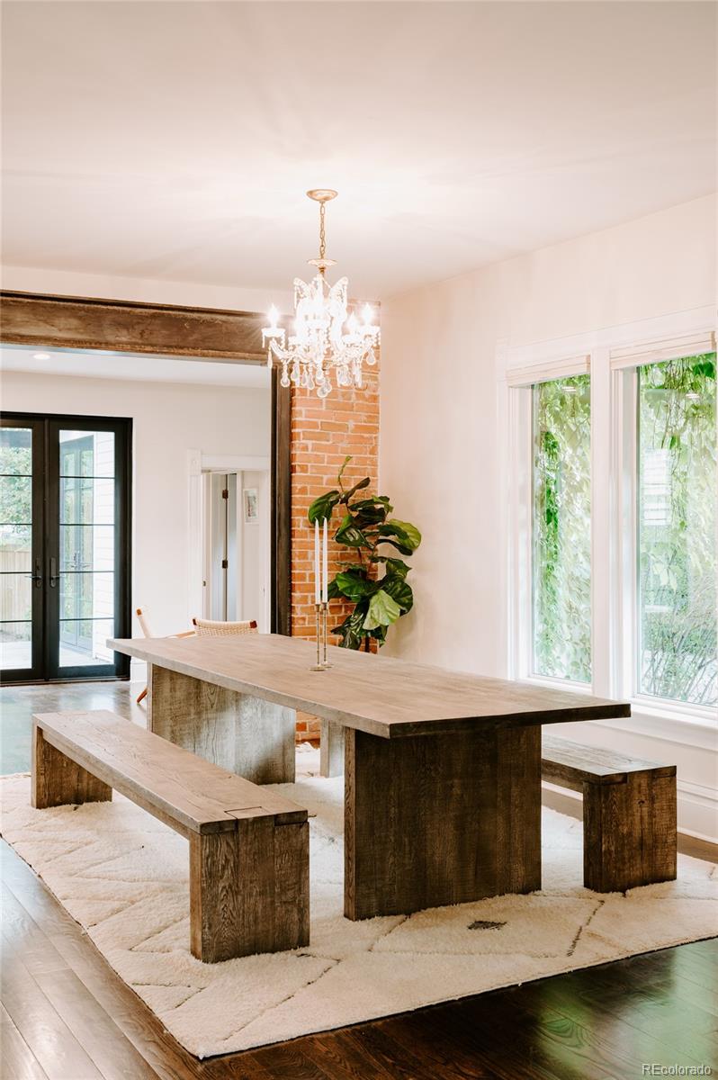 2040 Walnut Street Boulder, CO 80302 - Photo 7 of 40 a living room with furniture and a chandelier