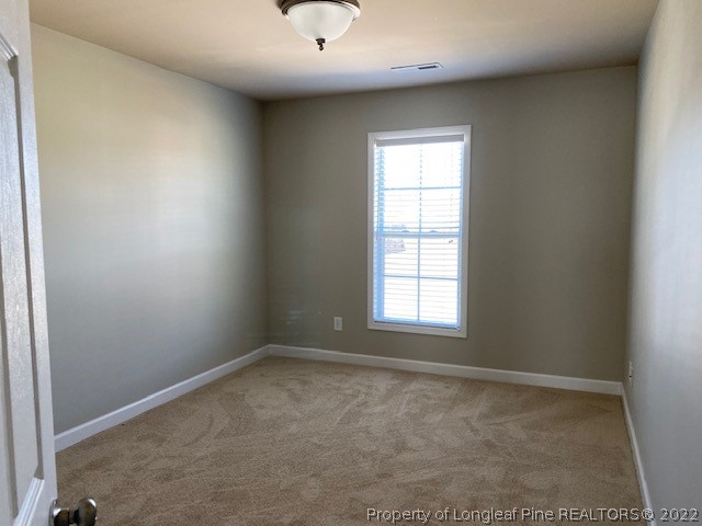 445 United Road Raeford, NC 28376 - Photo 16 of 26 an empty room with a window