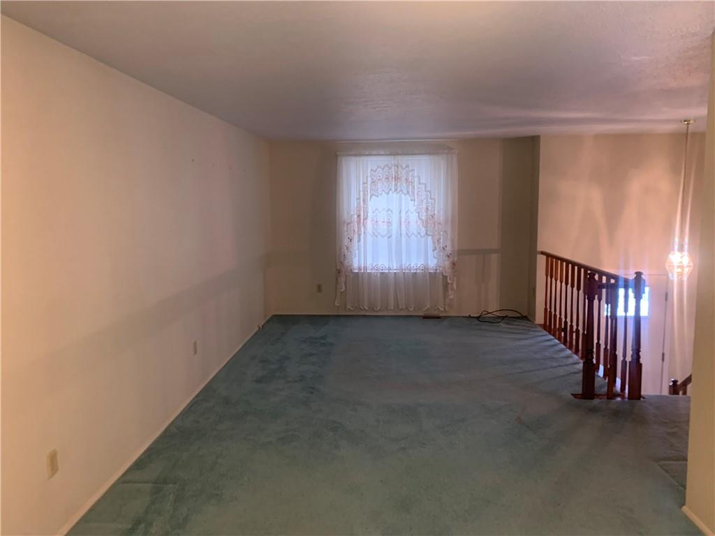 213 Library Court Duquesne, PA 15110 - Photo 15 of 38 an empty room with stairs