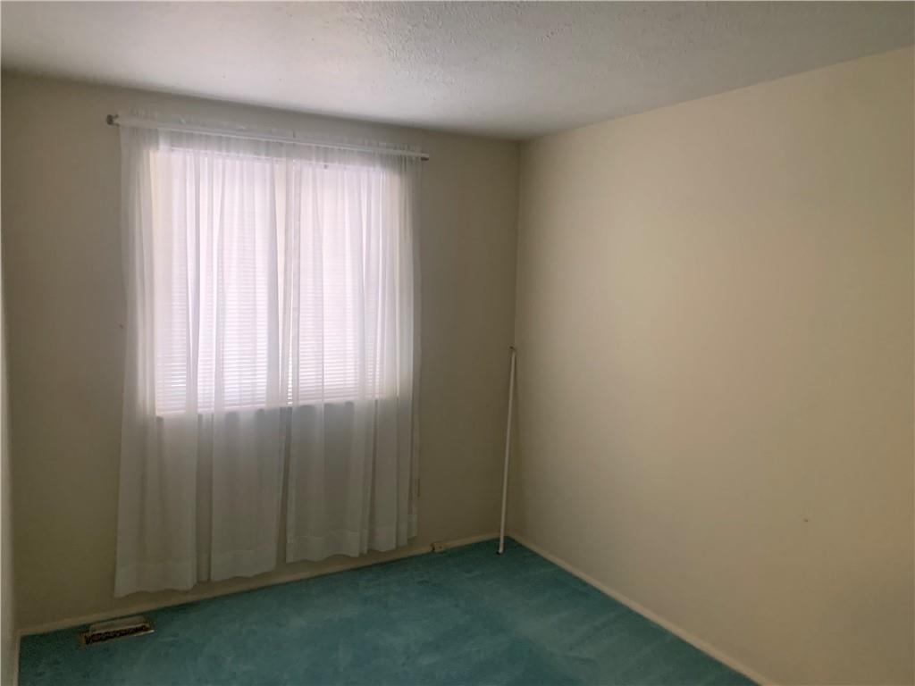 213 Library Court Duquesne, PA 15110 - Photo 18 of 38 an empty room with windows