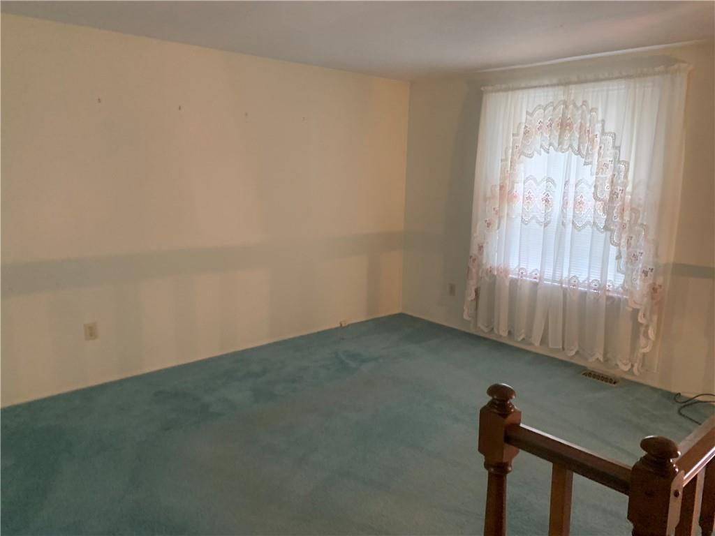 213 Library Court Duquesne, PA 15110 - Photo 2 of 38 a view of an empty room and window