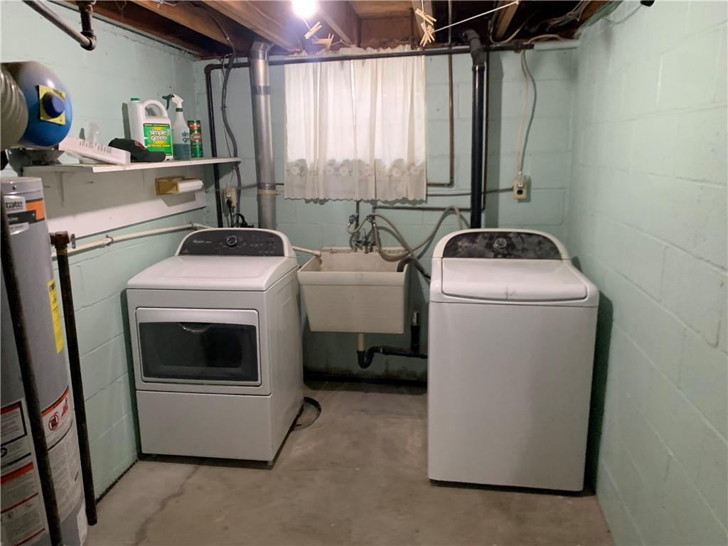 213 Library Court Duquesne, PA 15110 - Photo 21 of 38 a utility room with dryer and washer