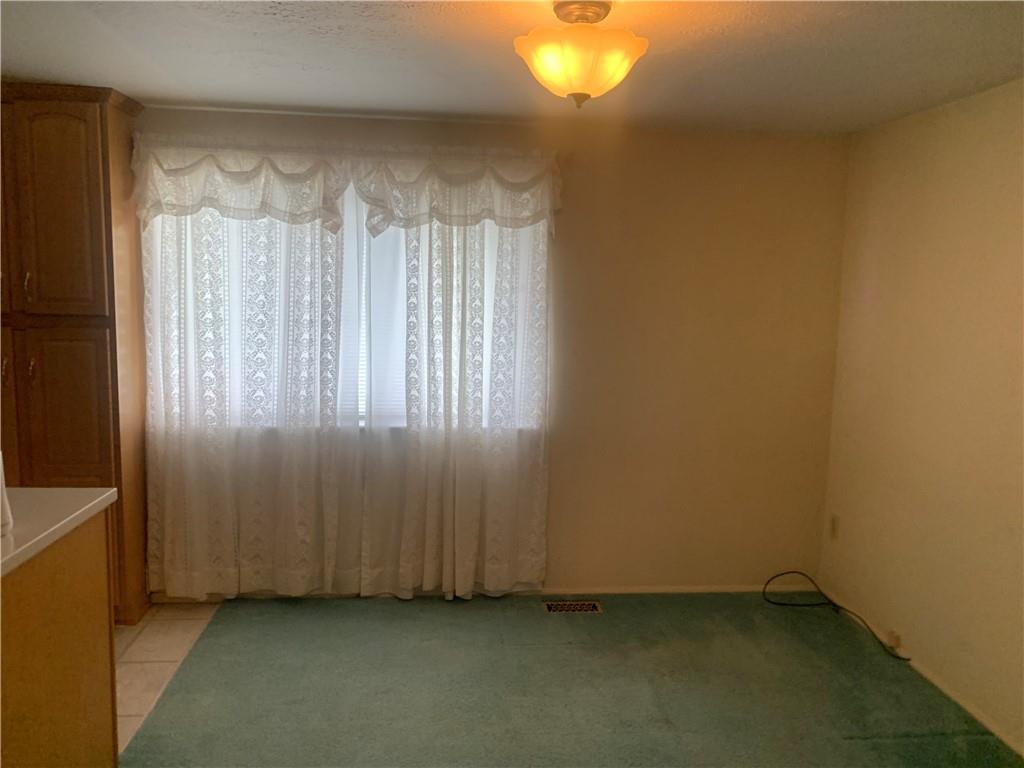 213 Library Court Duquesne, PA 15110 - Photo 3 of 38 a view of an empty room with a window