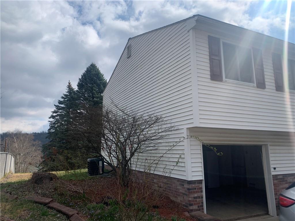 213 Library Court Duquesne, PA 15110 - Photo 33 of 38 a view of a house with a yard