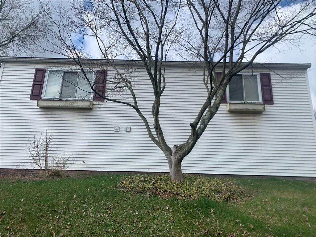 213 Library Court Duquesne, PA 15110 - Photo 35 of 38 a front view of a house with a yard