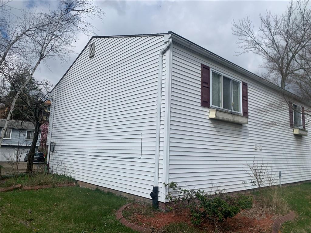 213 Library Court Duquesne, PA 15110 - Photo 36 of 38 a front view of a house with a yard