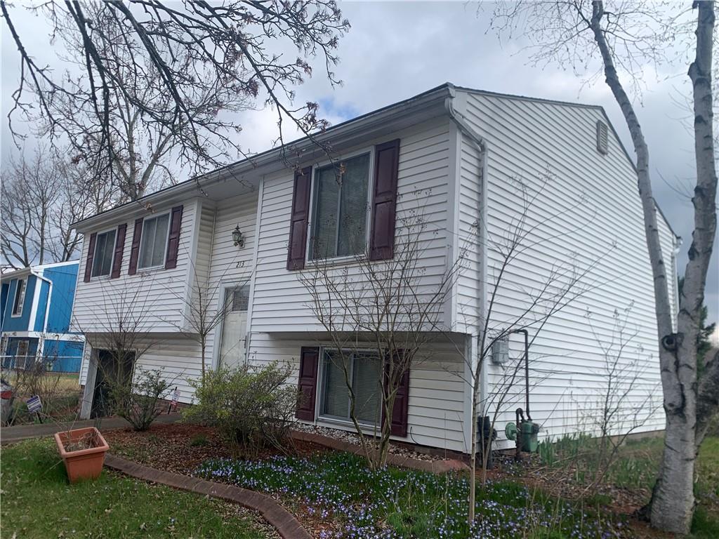 213 Library Court Duquesne, PA 15110 - Photo 38 of 38 a front view of a house with a garden