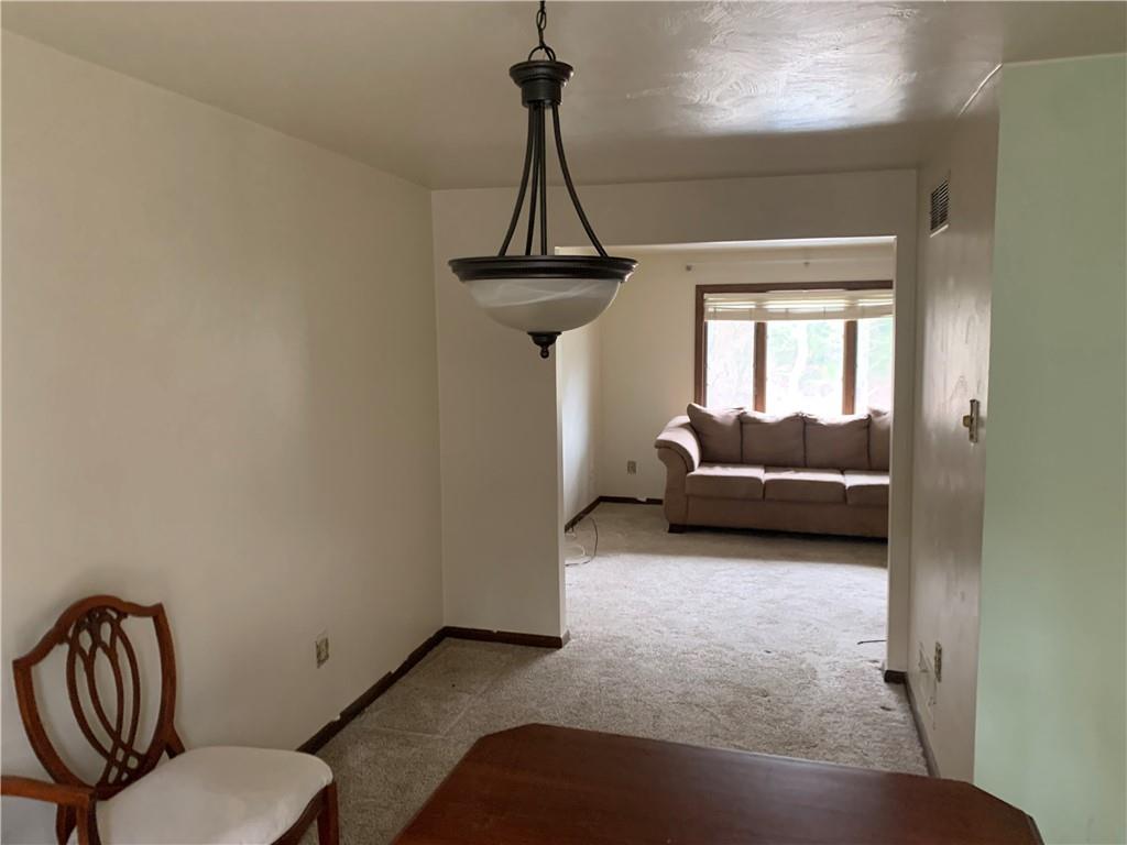 213 Library Court Duquesne, PA 15110 - Photo 4 of 38 a view of a livingroom with furniture and windows