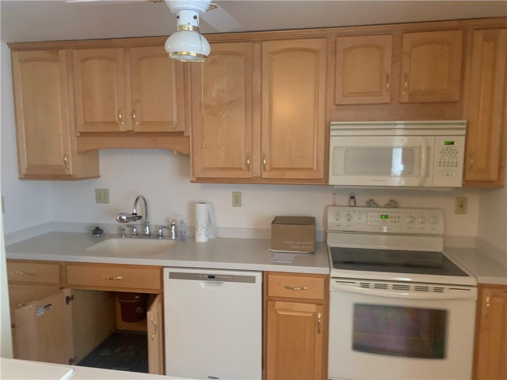 213 Library Court Duquesne, PA 15110 - Photo 6 of 38 a kitchen with appliances cabinets and a sink