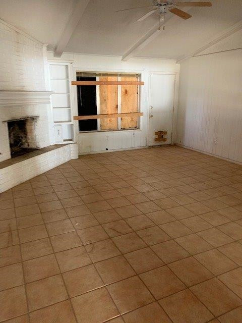 4819 73rd Street Lubbock, TX 79424 - Photo 2 of 7 an empty room with windows