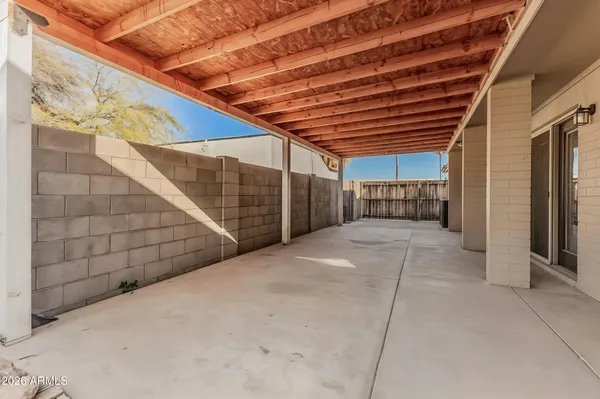 a kitchen with stainless steel appliances granite countertop a refrigerator a stove a sink and a microwave