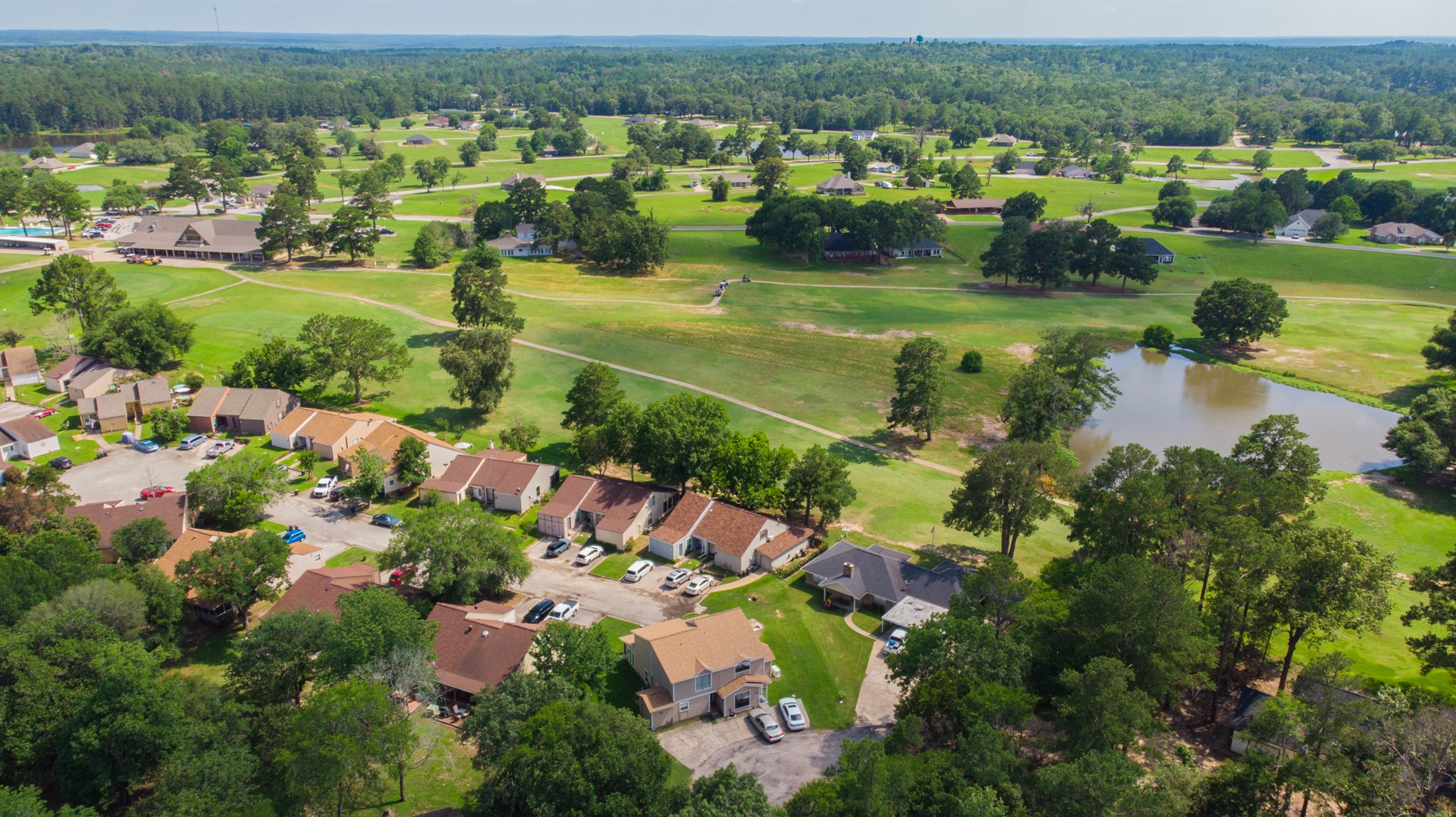 287 Broadmoor Street Trinity, TX 75862 - Photo 32 of 36 an aerial view of residential houses with outdoor space and lake view