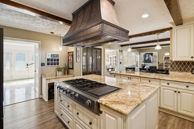 a bathroom with a double vanity sink mirror and