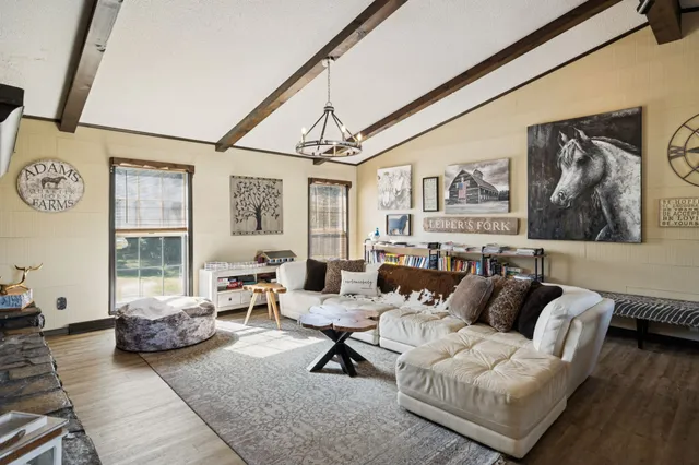 a view of washer and dryer with kitchen in the background