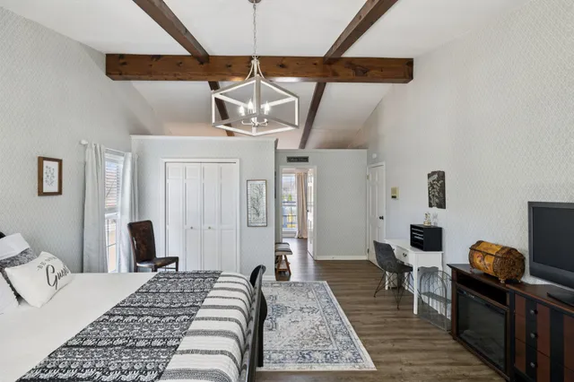 a bathroom with a sink a vanity and a mirror