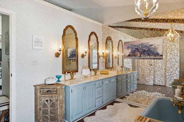 a bathroom with a toilet a sink and a bathtub