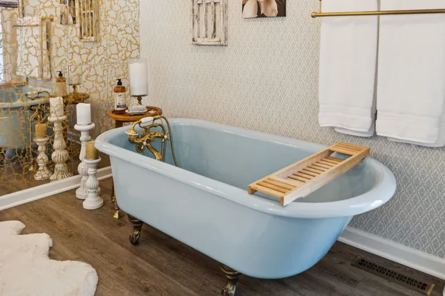 a bedroom with furniture and a bed