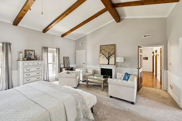 a bed room with a bed and a couch