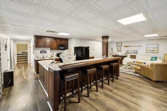 a view of a yard with large trees