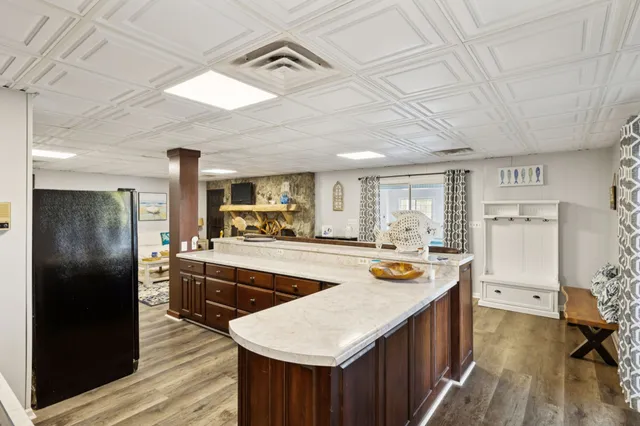 a view of a swimming pool with an outdoor space and seating area