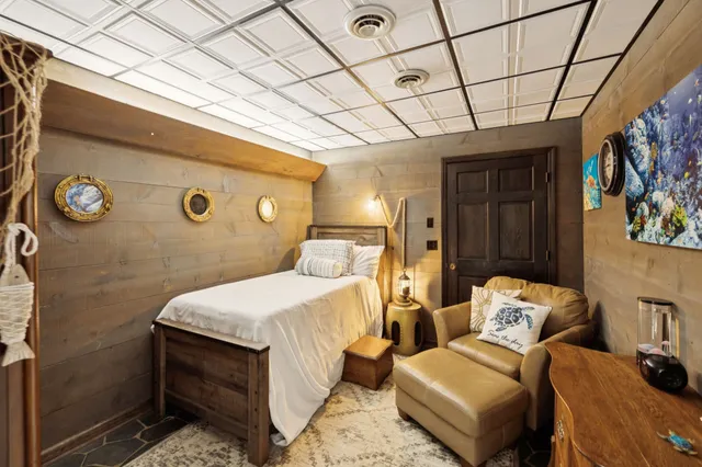 a swimming pool with some trees in the background