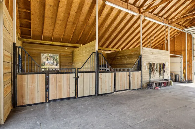 a view of a field with an ocean view