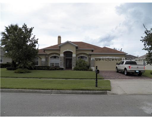 3914 Old Dunn Road Apopka, FL 32712 - Photo 1 of 1 a car parked in front of a house