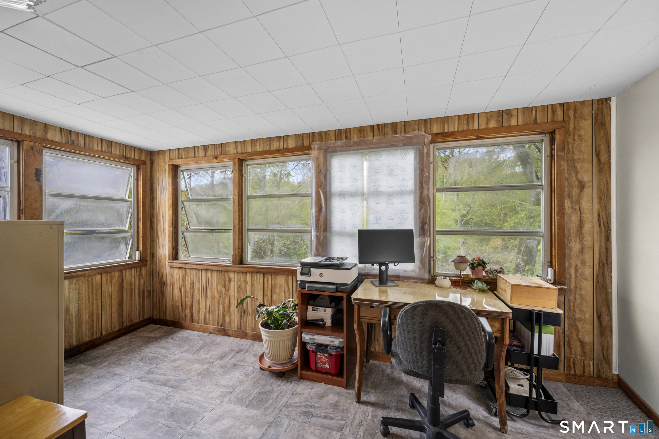 90 Sturtevant Street Norwich, CT 06360 - Photo 15 of 40 Sunroom for staying cool and bug-free in spring, summer, and fall evenings