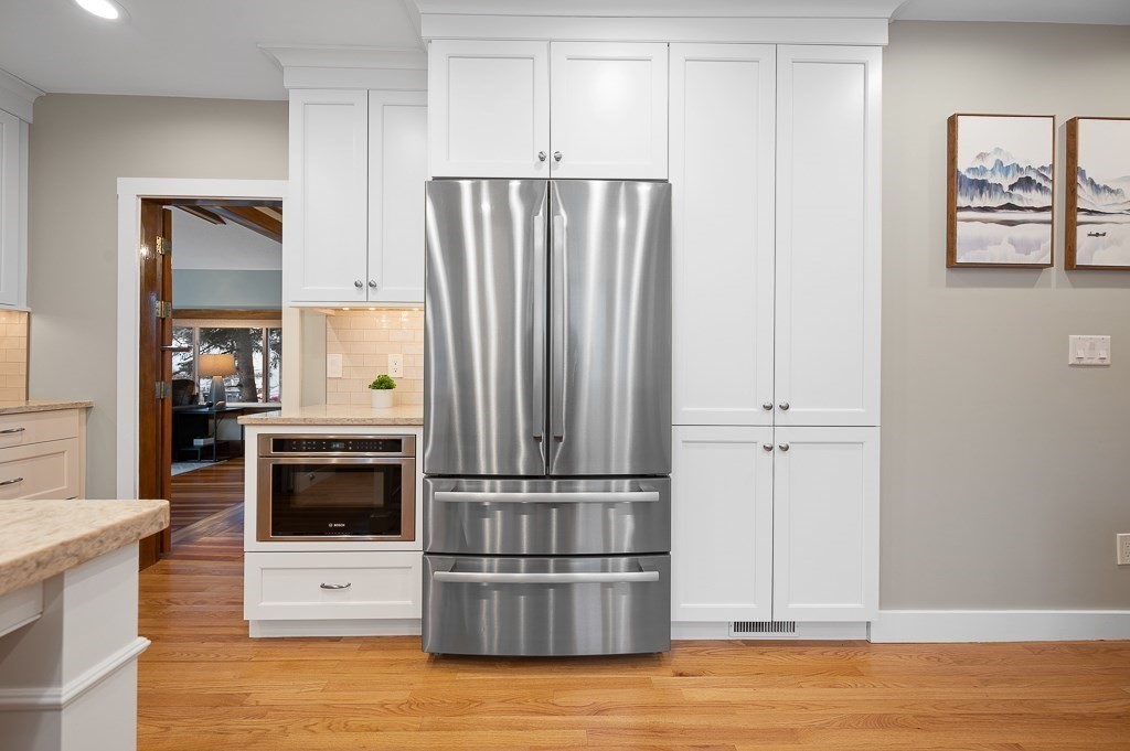 17 George Street Framingham, MA 01702 - Photo 12 of 38 a view of kitchen with furniture and wooden floor