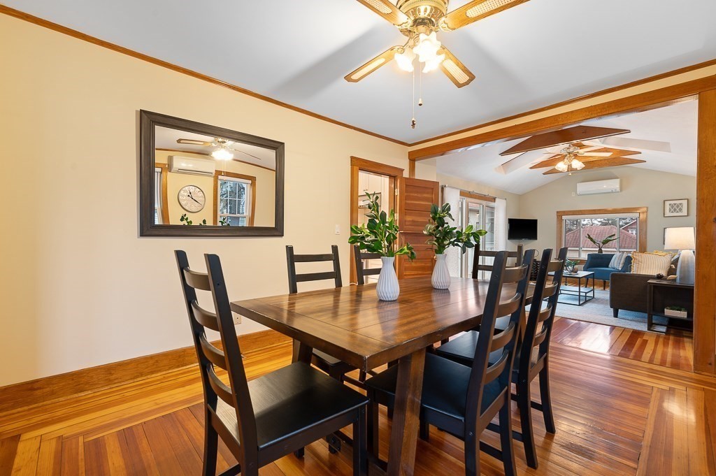 17 George Street Framingham, MA 01702 - Photo 13 of 38 a view of a dining room with furniture and wooden floor