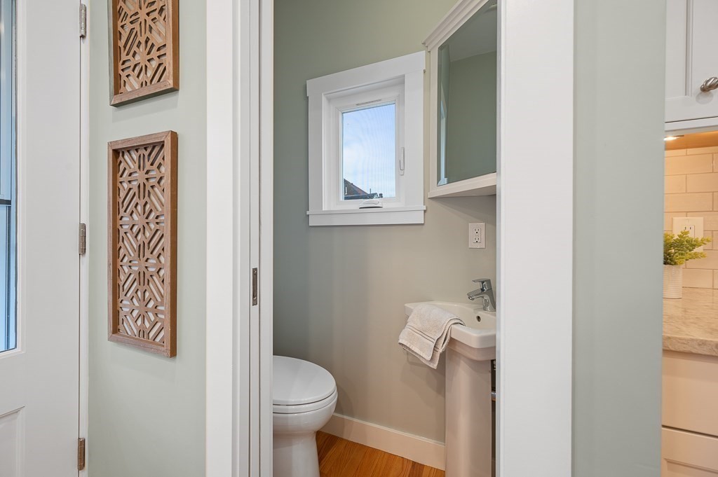 17 George Street Framingham, MA 01702 - Photo 17 of 38 a bathroom with a toilet and a sink