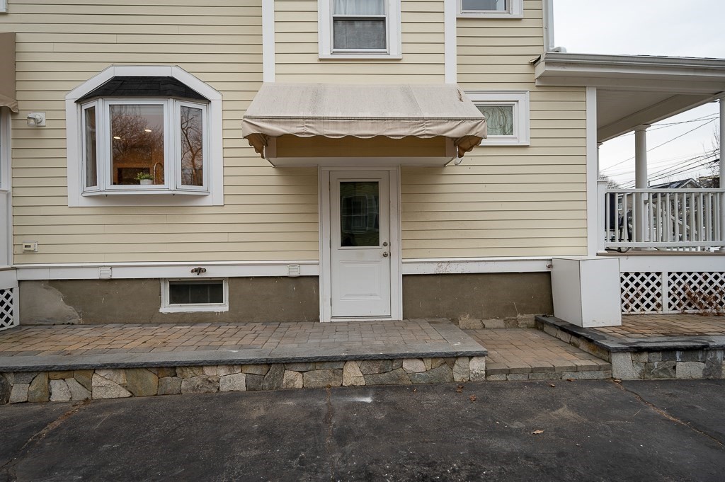 17 George Street Framingham, MA 01702 - Photo 33 of 38 a front view of a house with a garage