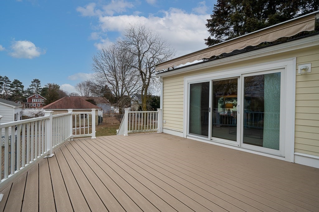 17 George Street Framingham, MA 01702 - Photo 38 of 38 a view of a house with a wooden deck