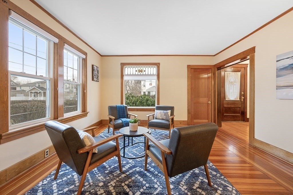 17 George Street Framingham, MA 01702 - Photo 7 of 38 a living room with furniture and a large window