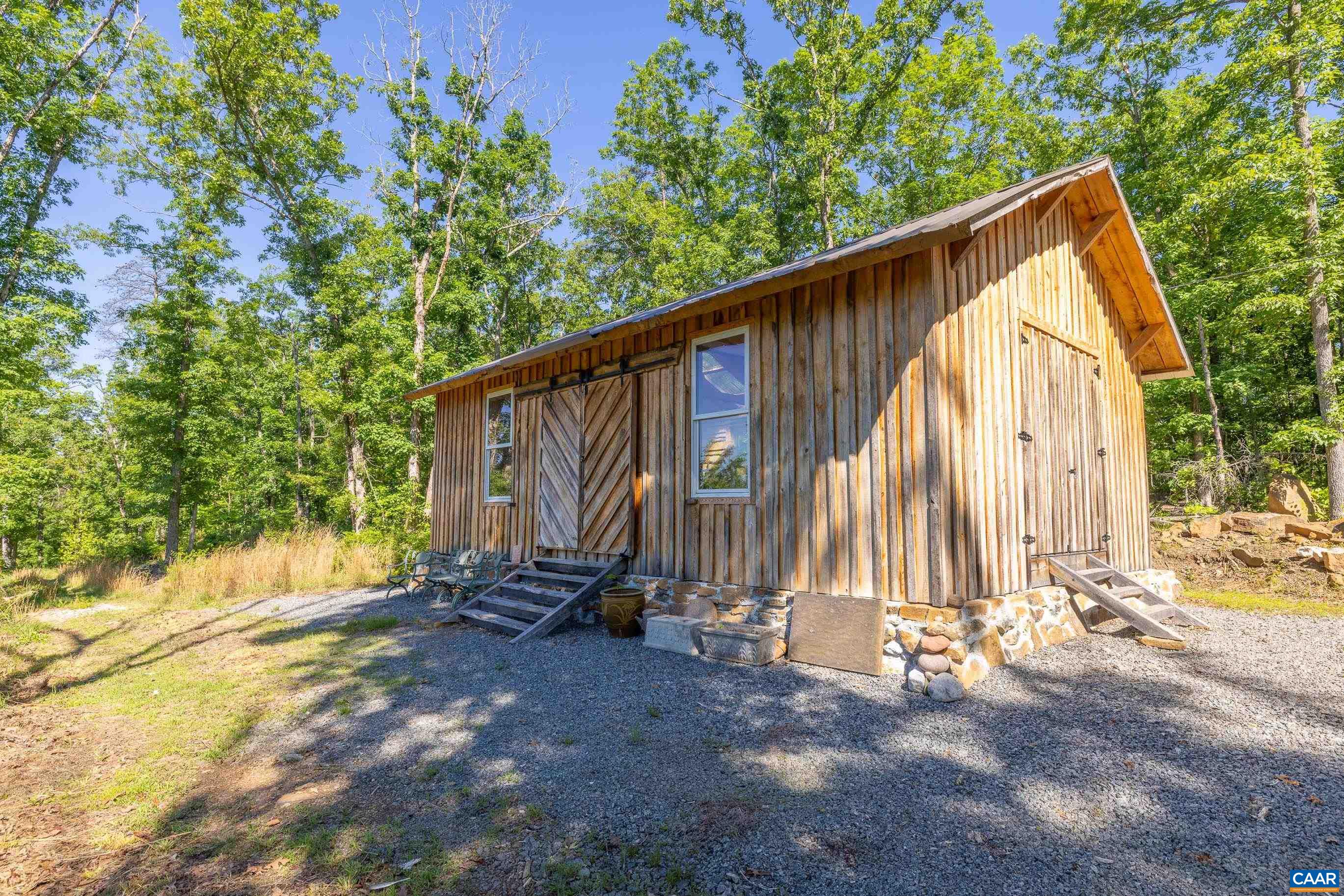 7676 Old Dominion Road Schuyler, VA 22969 - Photo 4 of 29 a view of backyard with tub and trees
