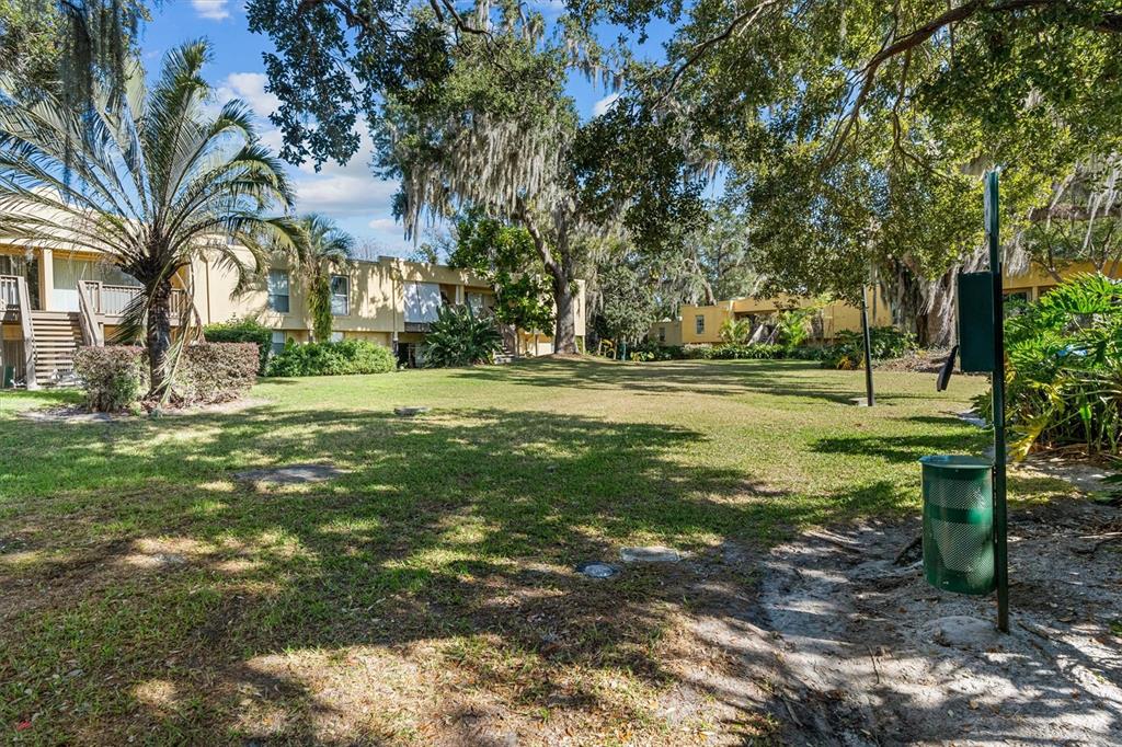 784 East Michigan Street, Unit 27 Orlando, FL 32806 - Photo 36 of 39 a view of a park with large trees