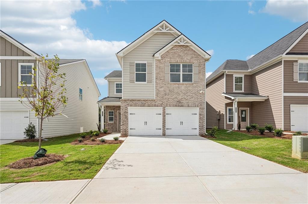 3014 Viewpark Circle Conyers, GA 30013 - Photo 1 of 44 a front view of a house with a yard