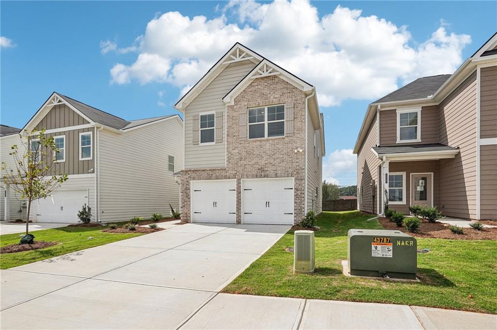 3014 Viewpark Circle Conyers, GA 30013 - Photo 2 of 44 a front view of a house with a yard