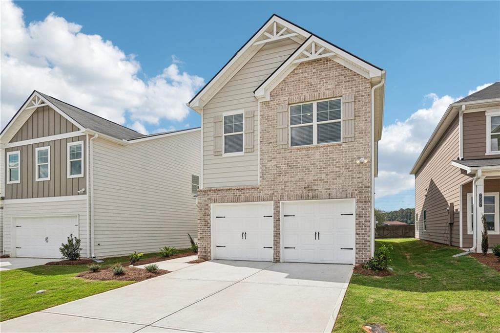 3014 Viewpark Circle Conyers, GA 30013 - Photo 3 of 44 a front view of a house with a yard