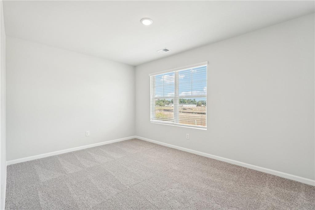 3014 Viewpark Circle Conyers, GA 30013 - Photo 40 of 44 an empty room with a window