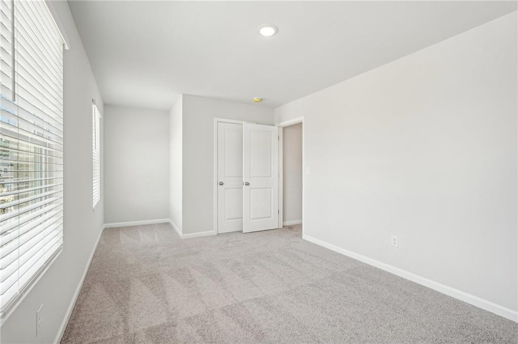 3014 Viewpark Circle Conyers, GA 30013 - Photo 41 of 44 an empty room with windows