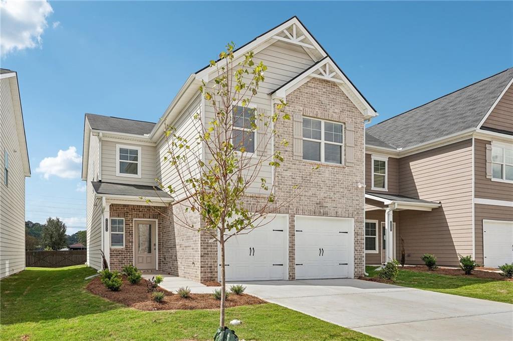 3014 Viewpark Circle Conyers, GA 30013 - Photo 5 of 44 a front view of a house with garden