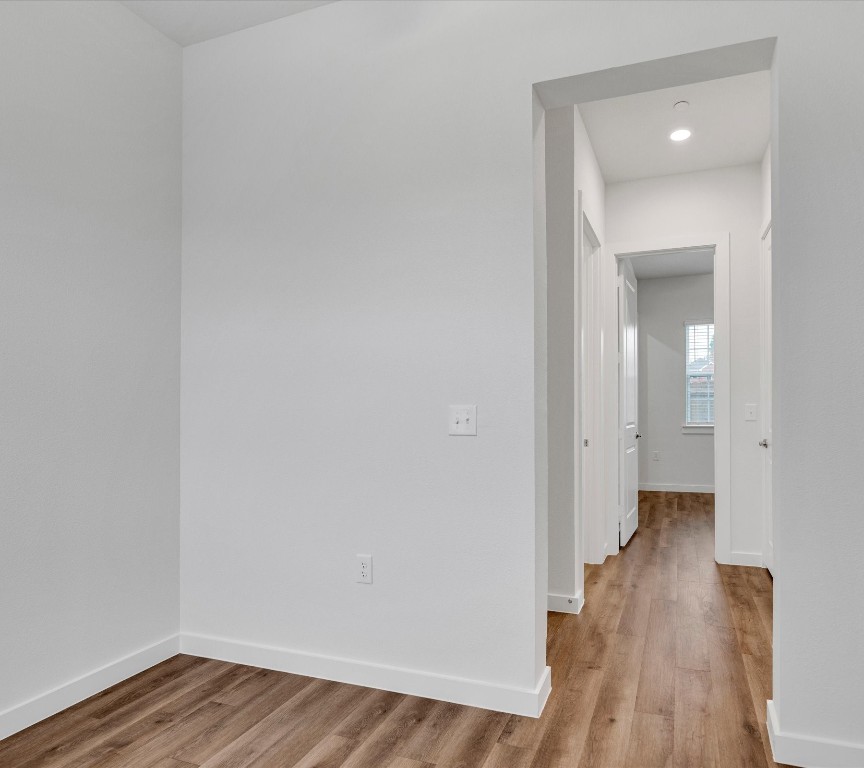2703-609 Rockhill Road McKinney, TX 75072 - Photo 12 of 18 a view of a room with wooden floor