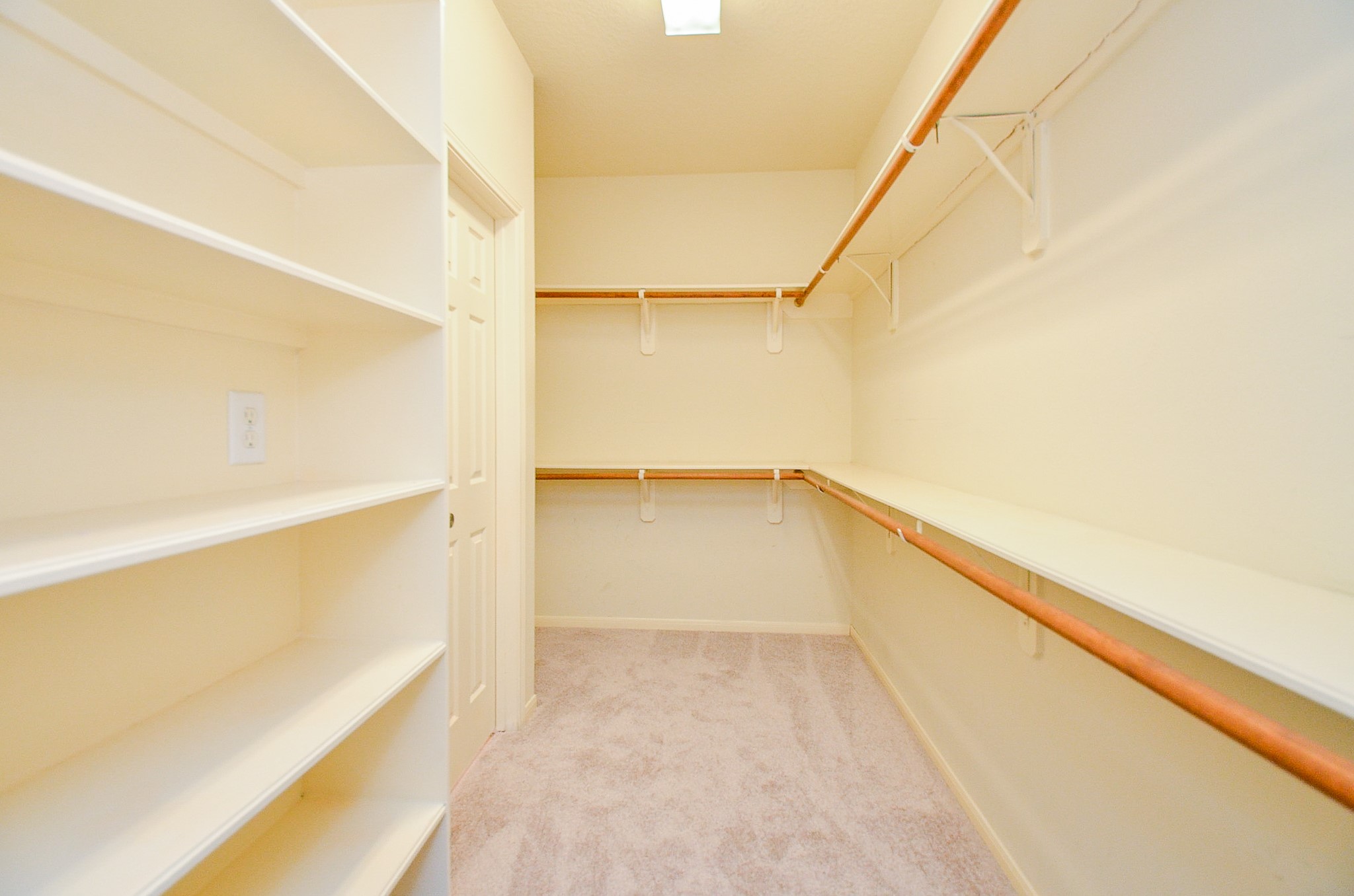 1222 Ragsdale Lane Katy, TX 77494 - Photo 20 of 31 a view of walk in closet with empty racks