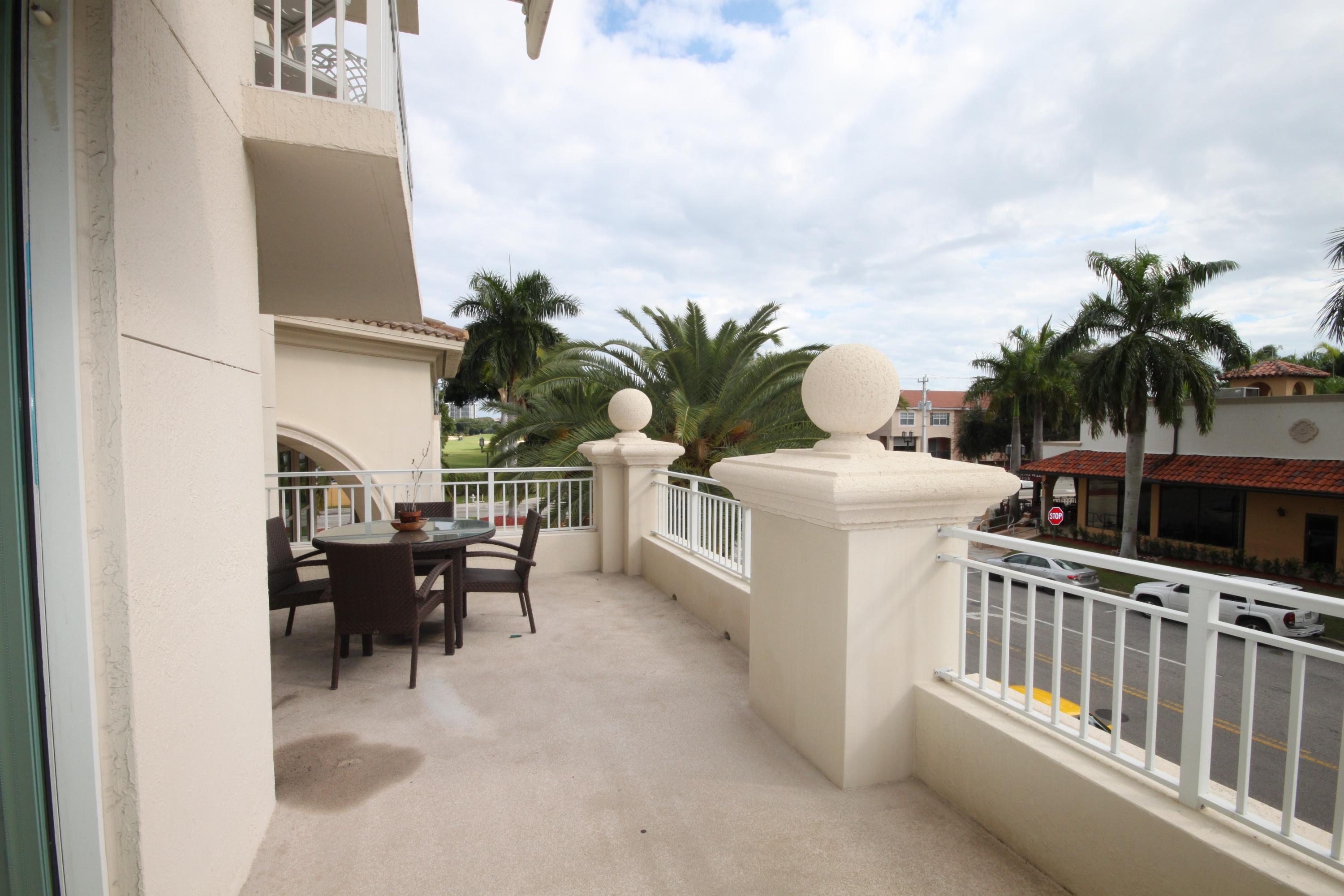99 Southeast Mizner Boulevard, Unit 219 Boca Raton, FL 33432 - Photo 13 of 14 a view of balcony and patio