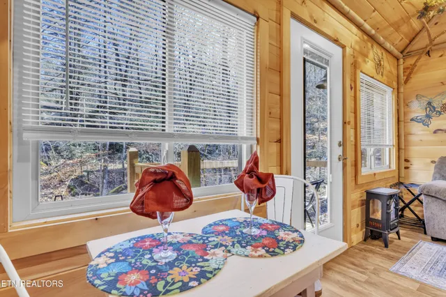 a kitchen with stainless steel appliances a refrigerator and a stove